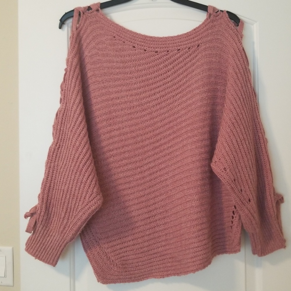 Shop Hope's sweater